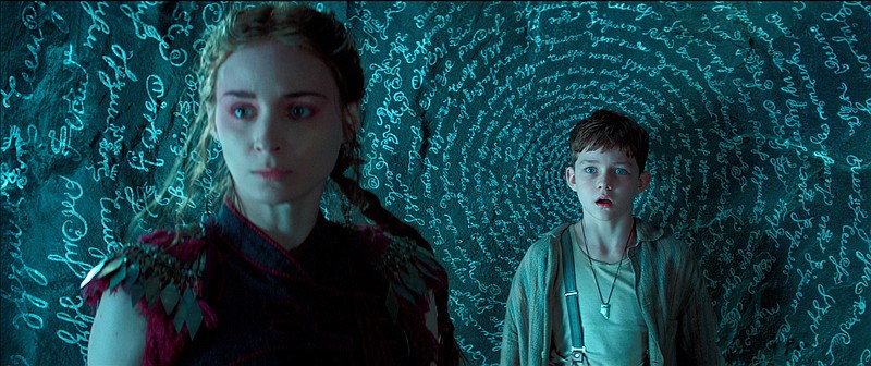 
              This photo provided by courtesy of Warner Bros. Pictures shows, Rooney Mara, left, as Tiger Lily, and Levi Miller as Peter, in a scene from the film, "Pan." The movie releases in U.S. theaters on Friday, Oct. 9, 2015. (Warner Bros. Pictures via AP)
            