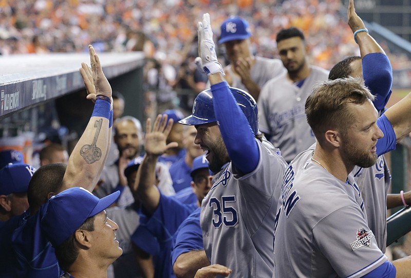 
              Kansas City Royals' Eric Hosmer, center, celebrates with teammates after his two-run home run against the Houston Astros in the ninth inning during Game 4 of baseball's American League Division Series, Monday, Oct. 12, 2015, in Houston. (AP Photo/David J. Phillip)
            