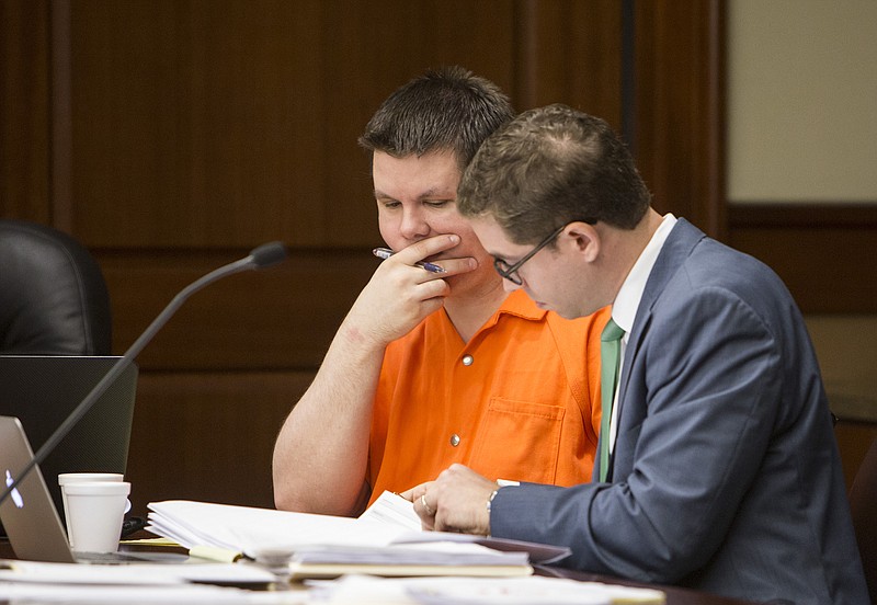 Justin Ross Harris, left, appears in court with his attorneys Carlos Rodriguez at Cobb Superior Court in Marietta, Ga., on Monday, Oct. 12, 2015.