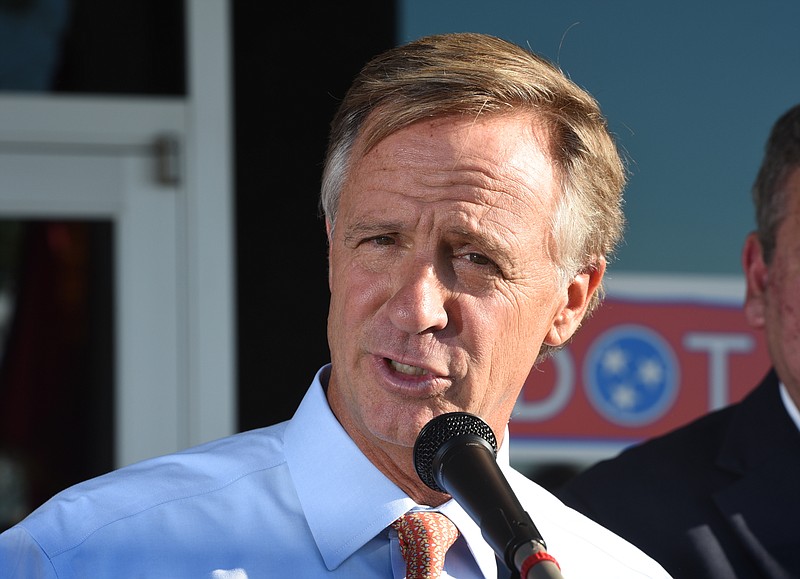 Tennessee Governor Bill Haslam talks about the commitment the state has to Volkswagen Wednesday outside the Tennessee Department of Transportation Management Center in Chattanooga. The governor had just come from visiting with workers inside the plant Wednesday afternoon, Oct. 7, 2015.