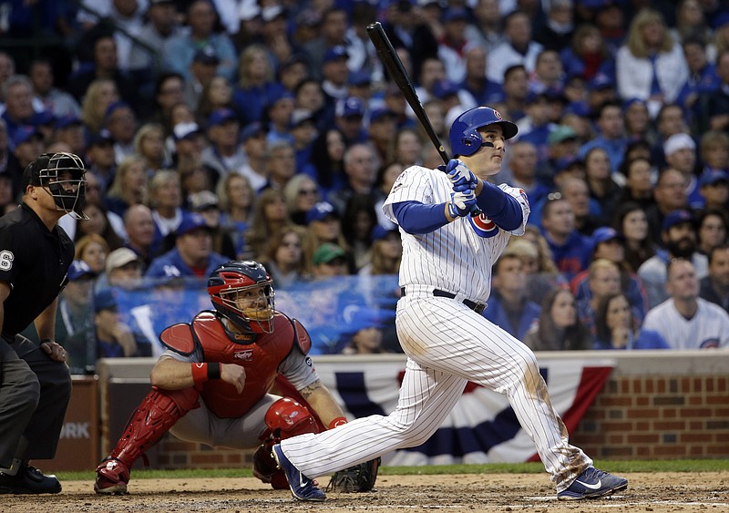 Chicago Cubs' Anthony Rizzo (44) hits a home run against the St. Louis Cardinals during the sixth inning of Game 4 in baseball's National League Division Series, Tuesday, Oct. 13, 2015, in Chicago.