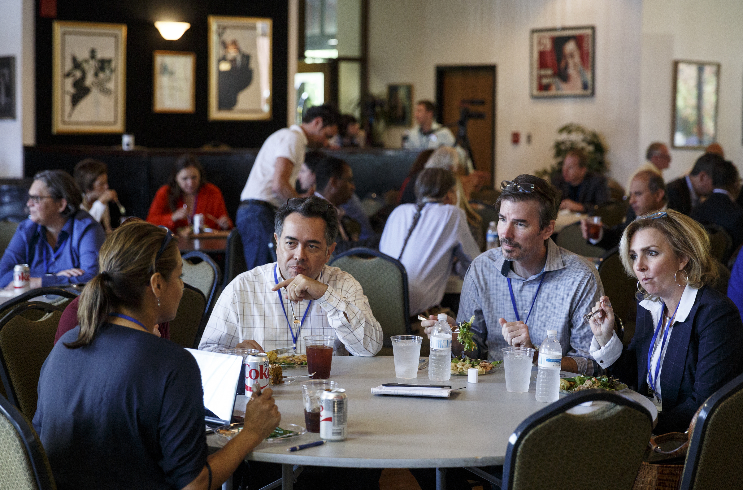 Investors and entrepreneurs talk over lunch on the closing day of the AngelSummit investors' summit Wednesday, Oct. 14, 2015, in Chattanooga, Tenn. Techstars founder Andrew Hyde was the keynote speaker for the summit, which connects startup business leaders and entrepreneurs.