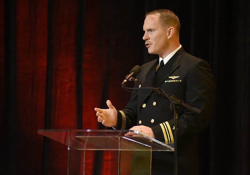 U.S. Navy Lt. Cmdr. Tim White, who fired at the shooter during the July 16 attack on the U. S. Naval and Marine Reserve Center, delivers the keynote speech at the CHI Memorial Heroes Luncheon at the Chattanoogan in Chattanooga in 2015.