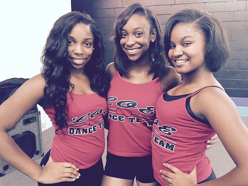 Johnny Harrington announced for the Ladies of Excellence. Its co-captains are, from left, Jazsmin Mason, 16, a student at Howard High School; Chrishonna Phinizey, 16, a student at Red Bank High; and Miracle Evans, 17, a student at Center for Creative Arts.