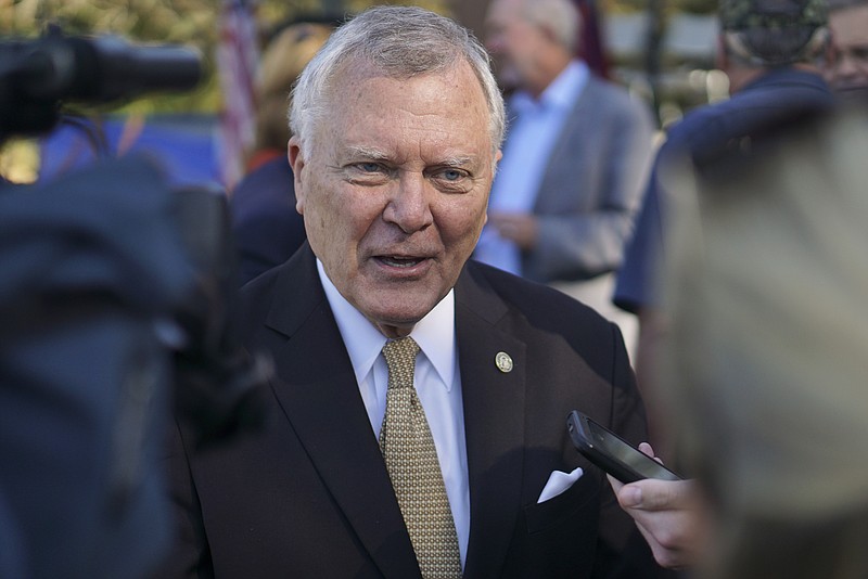 Staff Photo by Dan Henry / The Chattanooga Times Free Press- 10/15/15. Georgia Governor Nathan Deal speaks to media after a ceremonial ground breaking on the new Vanguard site in Trenton announcing that the Semi-trailer manufacturing plant is bringing 400 jobs to Dade County.