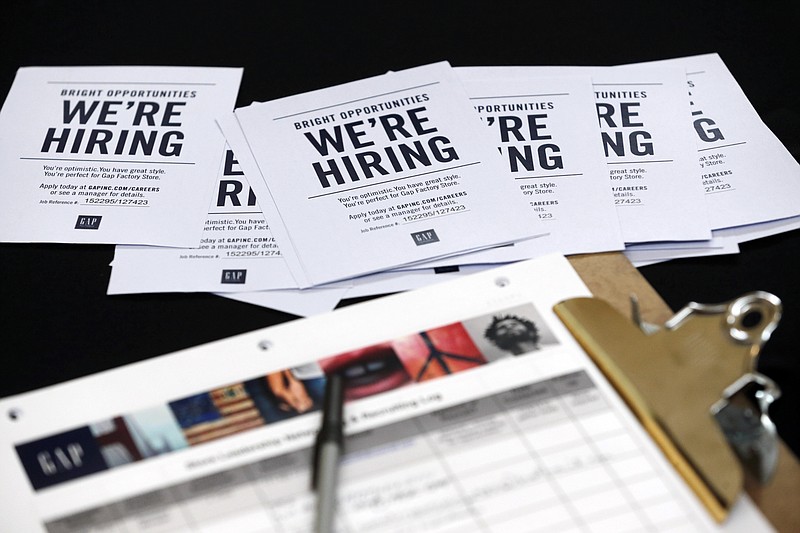 
              In this Tuesday, Oct. 6, 2015 photo, job applications and information for the Gap Factory Store sit on a table during a job fair at Dolphin Mall in Miami. Job openings slid to 5.4 million in August from a record high 5.7 million in July, the Labor Department said Friday, Oct. 16, 2015. Hiring was little-changed at 5.1 million. (AP Photo/Wilfredo Lee)
            