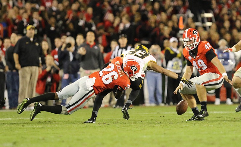 Georgia senior receiver Malcolm Mitchell not only had seven catches in Saturday night's 9-6 SEC East home win against Missouri, he also caused a fumble in punt coverage.