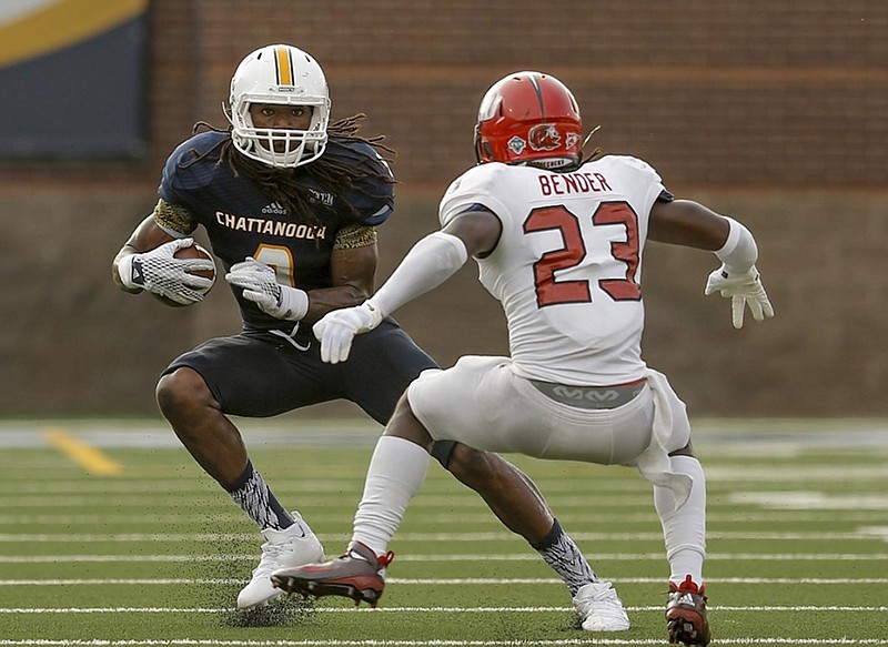 UTC wide receiver Alphonso Stewart, left, shown during this season's opening game against Jacksonville State, made a key play late in the Mocs' win at VMI on Saturday.