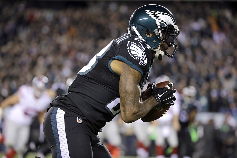 Philadelphia Eagles cornerback Nolan Carroll runs with the ball after intercepting a pass from New York Giants quarterback Eli Manning during the first half of an NFL football game Monday, Oct. 19, 2015, in Philadelphia. 