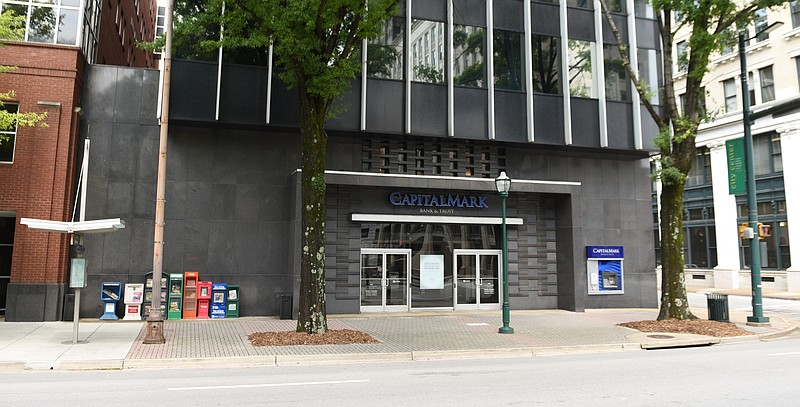 In this file photo, the former Pioneer Bank building, which housed CapitalMark Bank and Trust and other offices in July 2015, at the southwest corner of Broad and Eighth Streets in Chattanooga, Tenn. Byron Defoor has acquired the building for $7 million.