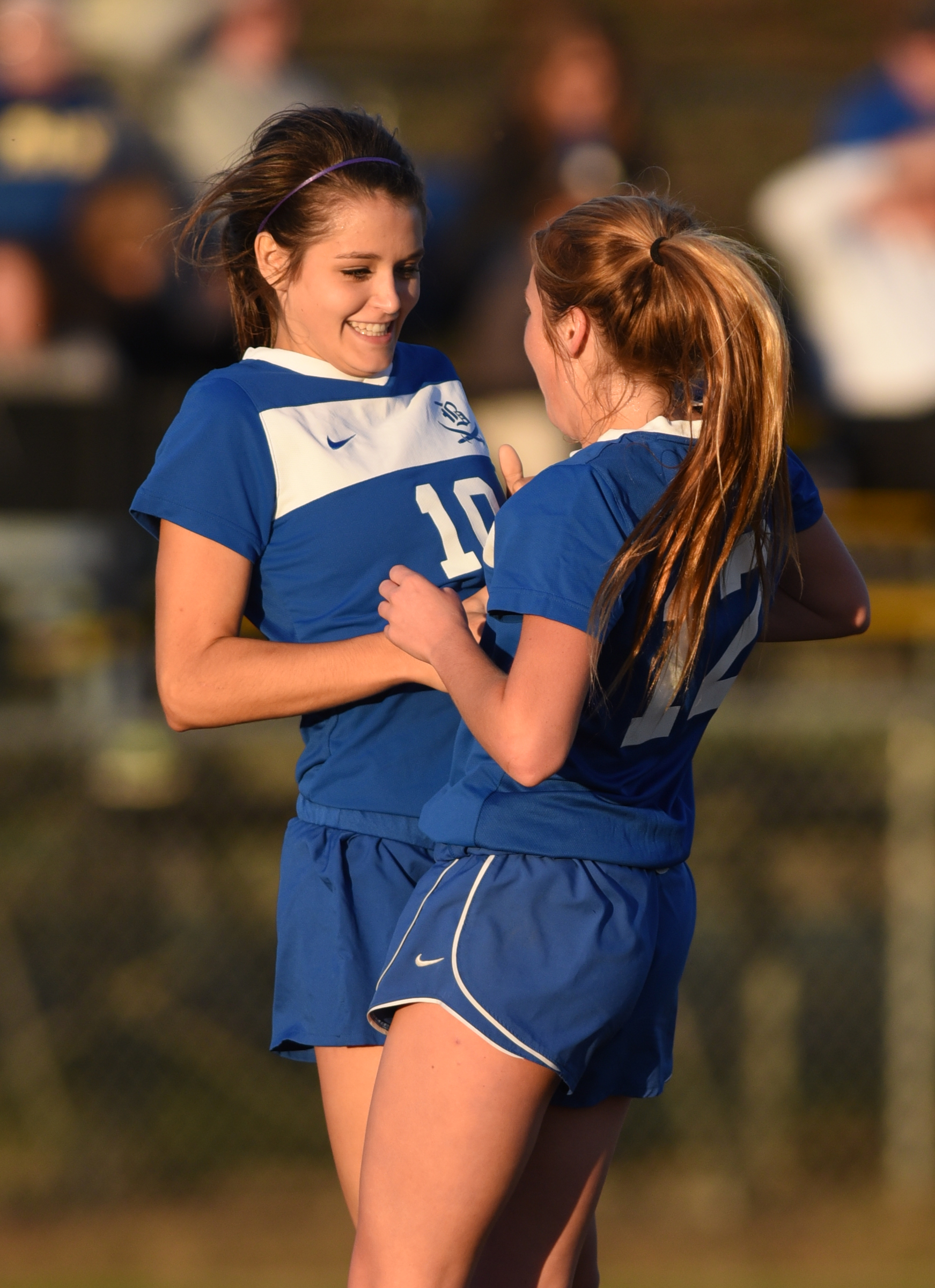 Boyd Buchanan's Logan Highfield, left, and Ariana Schoonover celebrate a goal in the game against Hixson Tuesday, October 20, 2015 at Hixson High School.