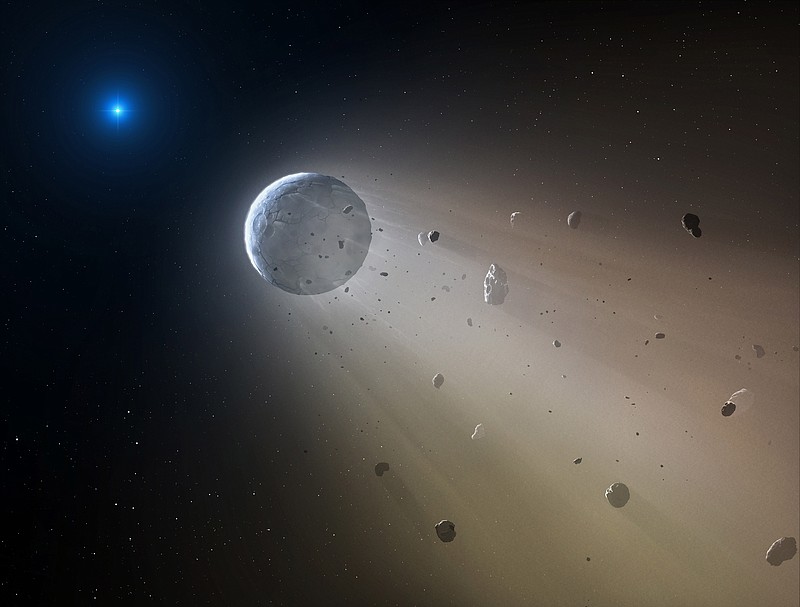 
              This artist's rendering provided by the Harvard-Smithsonian Center for Astrophysics shows an asteroid slowly disintegrating as it orbits a white dwarf star. On Wednesday, Oct. 21, 2015, researchers at the Harvard-Smithsonian Center for Astrophysics announced they have discovered a rocky object coming apart in a death spiral around a white dwarf star in the Constellation Virgo. They used NASA's Kepler spacecraft to make the discovery, then followed up with ground observations. (Mark A. Garlick/Harvard-Smithsonian Center for Astrophysics via AP)
            
