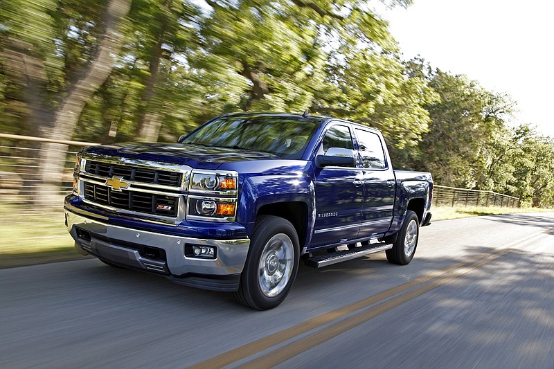 This undated photo provided by Chevrolet shows the 2014 Chevrolet Silverado. General Motors is recalling about 3,300 pickup trucks and SUVs, mainly in North America, because an ignition switch problem can make engines stall. The new recall covers 2014 Chevrolet Silverado and GMC Sierra light-duty pickups, 2015 heavy-duty pickups, and 2015 Suburban and Tahoe SUVs. (Chevrolet via AP, Tom Drew)