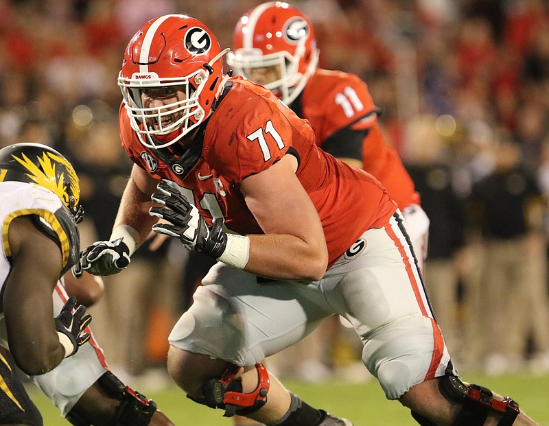 Georgia senior left tackle John Theus struggled last Saturday night against Missouri, allowing a sack and committing penalties for a false start and holding.