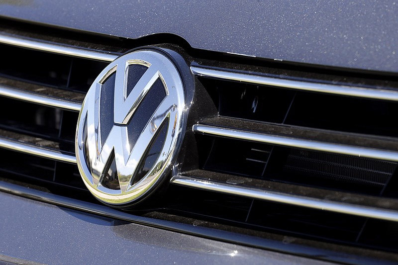 
              FILE - In this Sept. 24, 2015, file photo, the grille of a Volkswagen car for sale is decorated with the iconic company symbol in Boulder, Colo.  J.D. Power says Volkswagen Group's sales are expected to be flat in October, 2015, even as sales for the U.S. auto industry climb 8 percent toward what could be of the best Octobers in more than a decade. (AP Photo/Brennan Linsley, File)
            