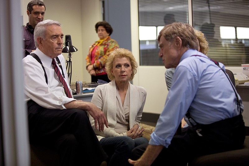 
              In this image released by Sony Pictures Classics, Dan Rather, from left, Mary Mapes and Robert Redford appear on the set of "Truth." (Lisa Tomasetti /Sony Pictures Classics via AP)
            