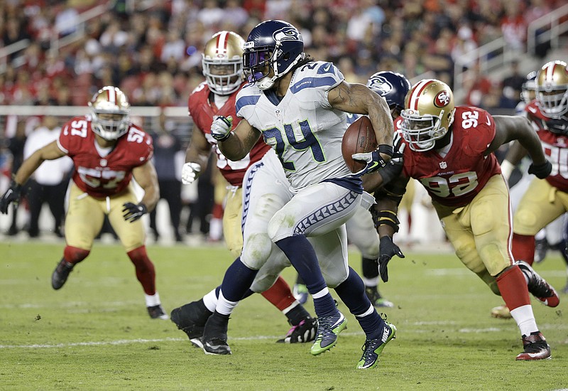 Seattle Seahawks running back Marshawn Lynch (24) runs against the San Francisco 49ers during the second half of an NFL football game in Santa Clara, Calif., Thursday, Oct. 22, 2015.