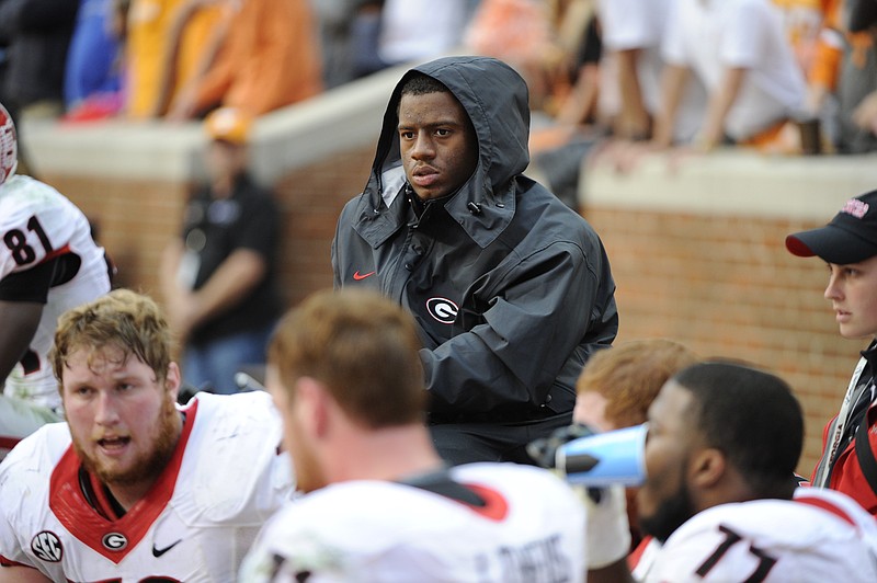 Georgia sophomore tailback Nick Chubb watches from the sideline at Tennessee on Oct. 10 after suffering a season-ending knee injury.