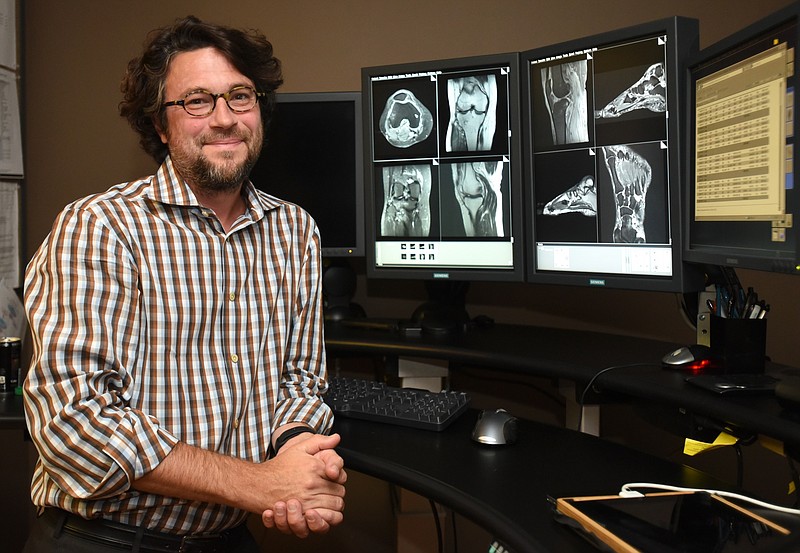 Radiologist Jim Busch stands in his McCallie Avenue office Friday, October 23, 2015. 