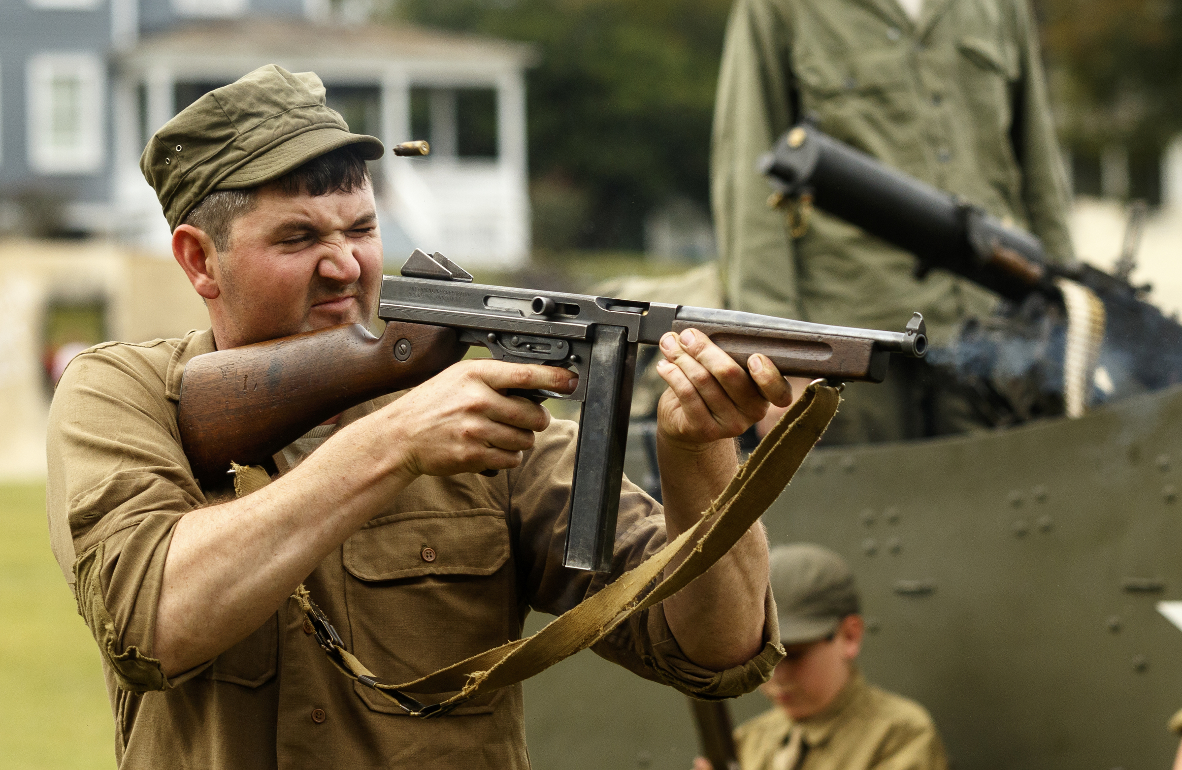 Nelson Adcock fires a Thompson submachine gun during a demonstration at the 6th Cavalry Museum's 6th annual Remembering Our Heroes event on Saturday, Oct. 24, 2015, in Fort Oglethorpe, Ga. The event featured one World War II battle re-enactment, but the second re-enactment was changed to a firing demonstration after lower spectator turnout.