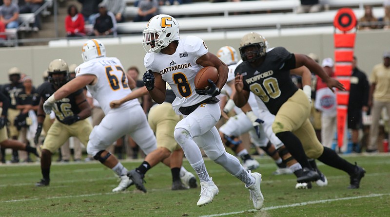 UTC's C.J. Board runs the ball against against Wofford in their game Saturday, Oct. 24, 2015.