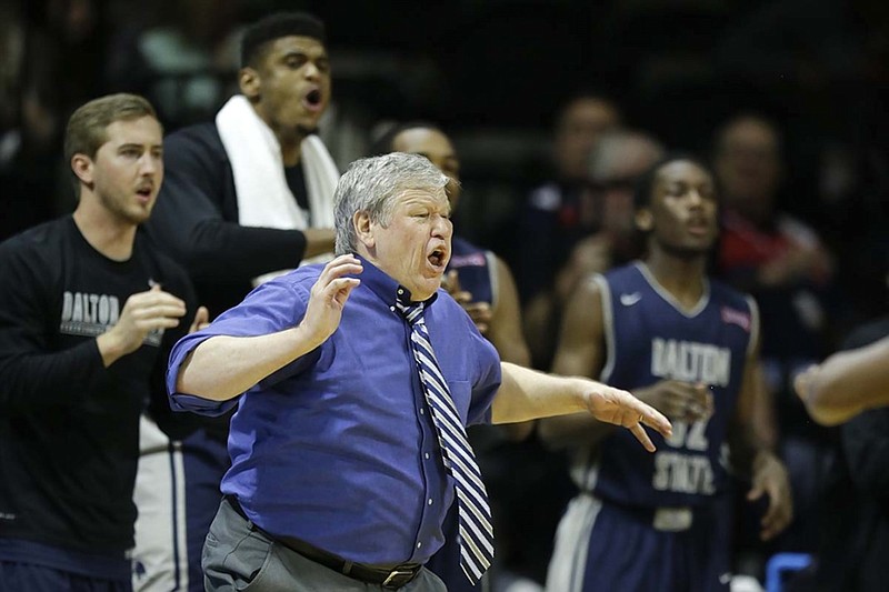 Dalton State College men's basketball coach Tony Ingle shouts instructions to his team during the second half of last season's NAIA Division I championship game against Westmont in Kansas City, Mo. Dalton State won the title in its first year of eligibility and second year overall.