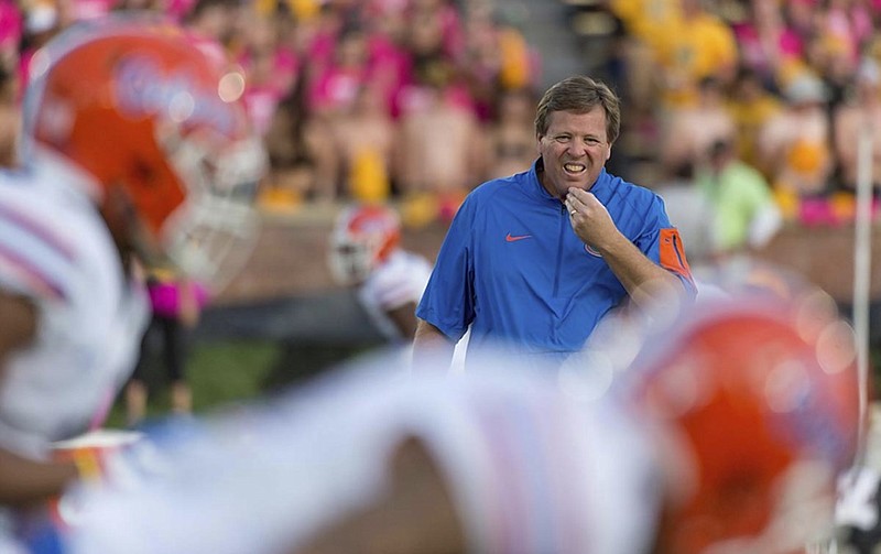 Florida football coach Jim McElwain will take part in the Gators' annual rivalry clash with Georgia in Jacksonville for the first time on Saturday. Bulldogs coach Mark Richt is familiar with the atmosphere after 14 previous Georgia-Florida games.