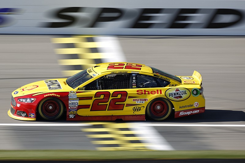 NASCAR Sprint Cup Series auto racing driver Joey Logano takes a practice lap at Kansas Speedway in Kansas City, Kan., Saturday, Oct. 17, 2015. 