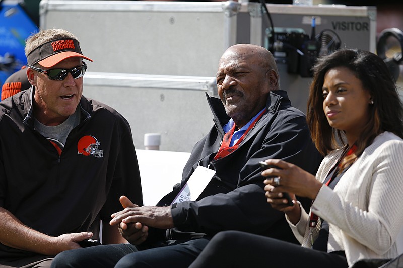 Former running back Jim Brown watches the Cleveland Browns warm up before an NFL football game against the New York Jets at MetLife Stadium in East Rutherford, N.J., in this Sept. 13, 2015, file photo.