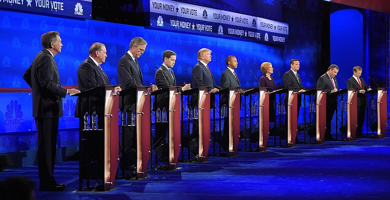 Republican presidential candidates take the stage during the CNBC Republican presidential debate in Boulder, Colo.