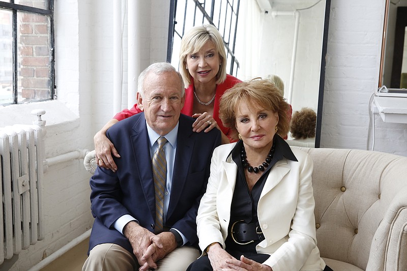 
              In this image released by ABC,  John and Jan Ramsey pose with Barbara Walters, right, for her "American Scandal" series for Discovery. Walters is revisiting some of her biggest news stories for "American Scandals," a new 9-episode series that premieres on Investigation Discovery on Monday at 10 p.m. EST. (Heidi Gutman/ABC via AP)
            