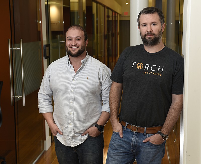 CXO (chief experience officer) Wayne Fullam, left, and COO Jack Studer of Torch are photographed at the Lamp Post Group on Monday, Oct. 26, 2015, in Chattanooga, Tenn. 