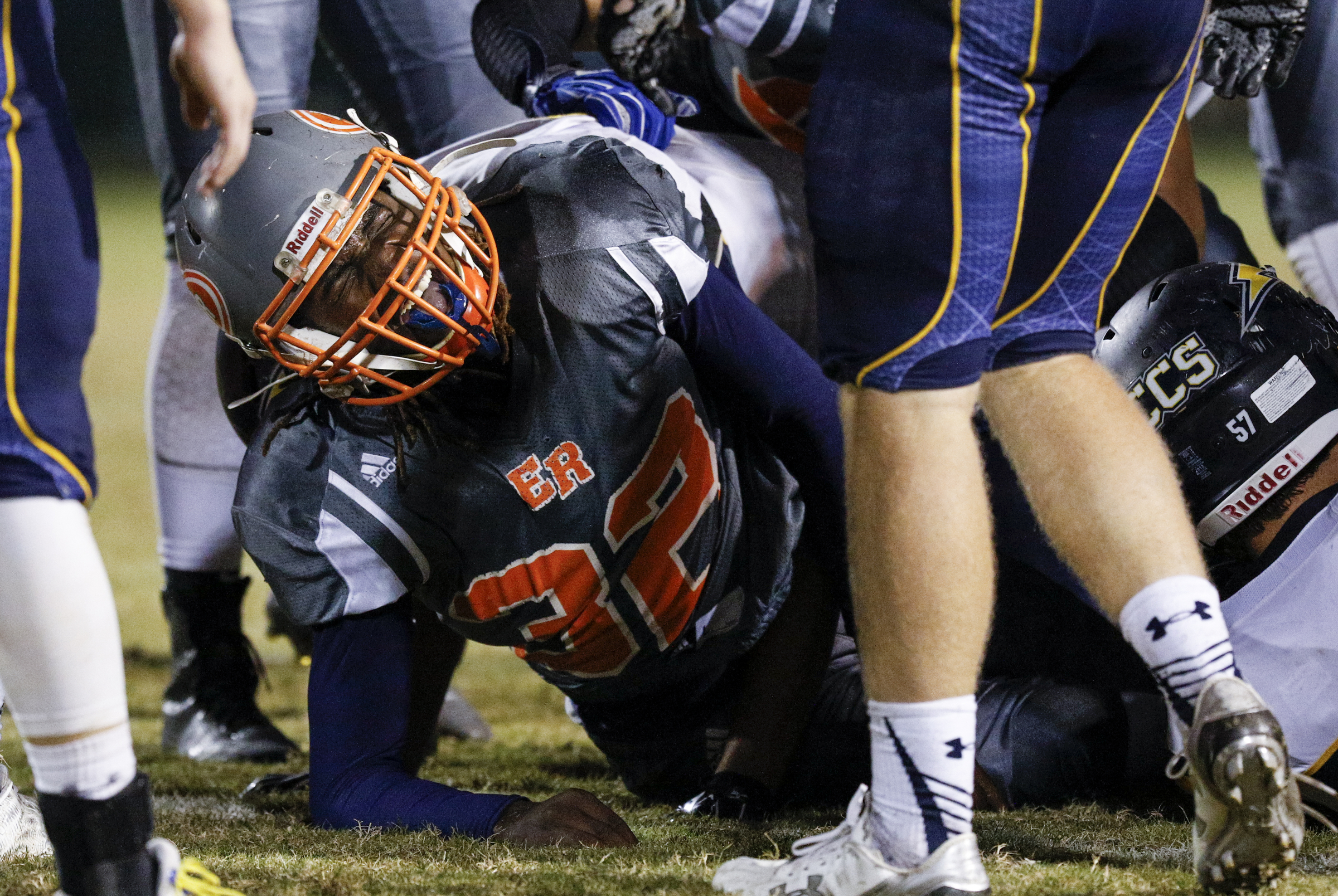 East Ridge running back Traneil Moore winces after he was injured on a play during their prep football game against CCS at East Ridge High School on Friday, Oct. 30, 2015, in East Ridge, Tenn.