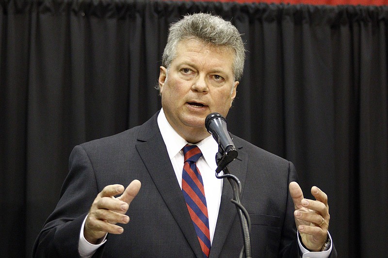 
              Democratic Attorney General Jim Hood speaks about his agency's attack on cybercrime as he speaks about his reelection bid to hundreds of people Thursday, Oct. 29, 2015, at Hobnob, a casual gathering sponsored by the state chamber of commerce, the Mississippi Economic Council. Many of the major candidates for statewide elected office addressed the group. The general election is next Tuesday. (AP Photo/Rogelio V. Solis)
            