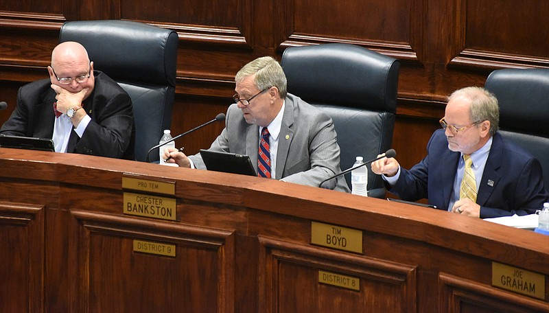 Hamilton County Commissioners Jim Fields, left, Chester Bankston, center, and Tim Boyd, right, and their colleagues will consider this week whether to take the first steps to putting a cigarette tax to a public vote next year in support of arts programming.