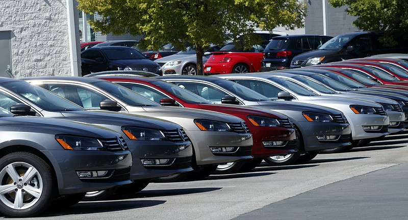 Volkswagen Passats are parked in a lot at Village Volkswagen on Tuesday, Sept. 22, 2015, in Chattanooga. Volkswagen has halted sales of 2014 and 2015 diesel Passats and certain other diesel vehicles after the EPA announced Friday that it would order Volkswagen to recall nearly 500,000 vehicles in the U.S. because they were equipped with software that allowed them to evade emissions testing.