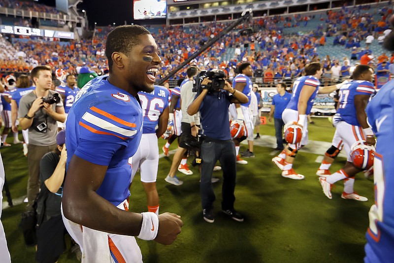 Florida quarterback Treon Harris, a backup for most of this season, celebrates with teammates after last Saturday's 27-3 drubbing of Georgia in Jacksonville.