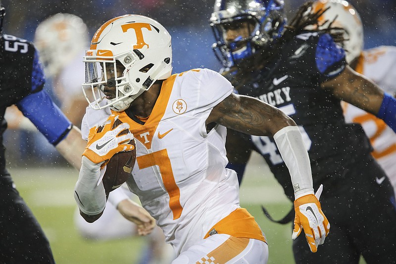Tennessee defensive back Cameron Sutton runs a punt return for a touchdown during the second half of an NCAA college football game against Kentucky, Saturday, Oct. 31, 2015, in Lexington, Ky. Tennessee won 52-21.
