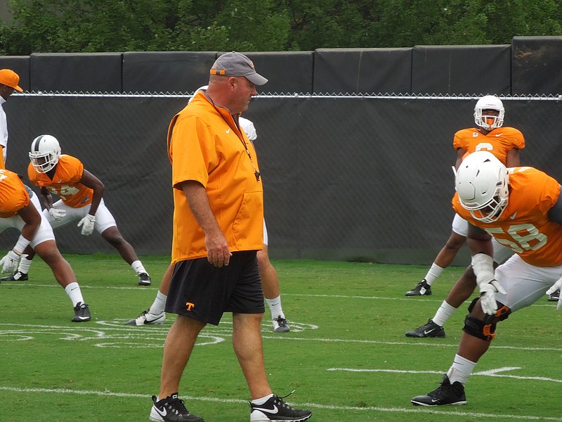 Tennessee defensive line coach Steve Stripling watches his players prepare for preseason practice on August 11, 2015, at Haslam Field in Knoxville.