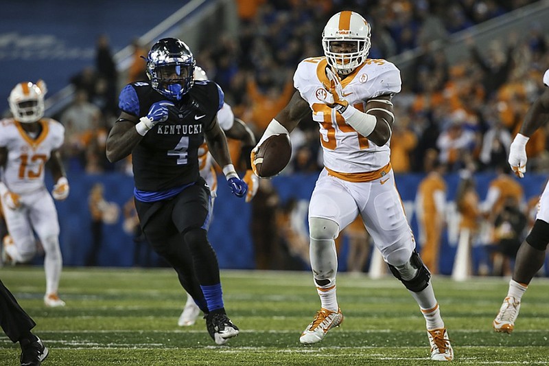 Tennessee freshman linebacker Darrin Kirkland Jr. returns an interception during last week's game at Kentucky.