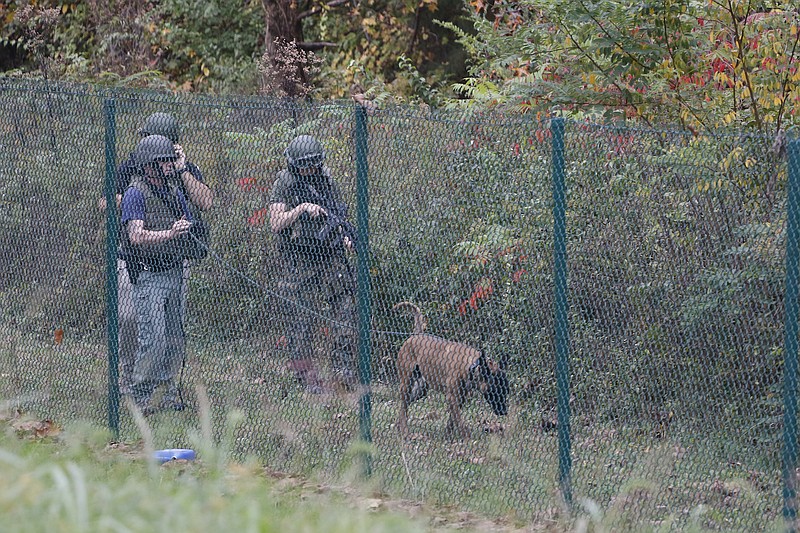 Chattanooga Police and SWAT respond to a shots fired call at the Navy Operational Support Center and Marine Corps Reserve Center off of Amnicola Highway on Wednesday, November 4, 2015.