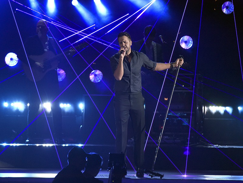 Luke Bryan performs at the 49th annual CMA Awards at the Bridgestone Arena on Wednesday, Nov. 4, 2015, in Nashville.