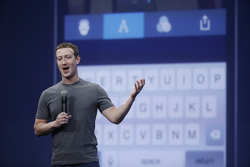 
              FILE - In this March 25, 2015, file photo, Mark Zuckerberg talks about the Messenger app during the Facebook F8 Developer Conference in San Francisco. Facebook reports quarterly financial results on Wednesday, Nov. 4, 2015. (AP Photo/Eric Risberg, File)
            