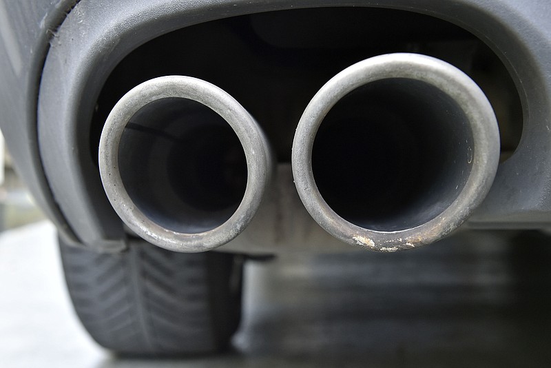 The exhaust pipes of an up to date Audi car blow out not visible emissions during the engine start in Gelsenkirchen, Germany, on Wednesday, Nov. 4, 2015.