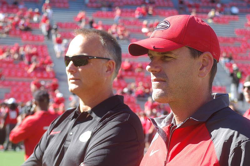 Georgia football coach Mark Richt, left, is in his 15th season with the Bulldogs, but it's his first without former offensive coordinator and quarterbacks coach Mike Bobo.