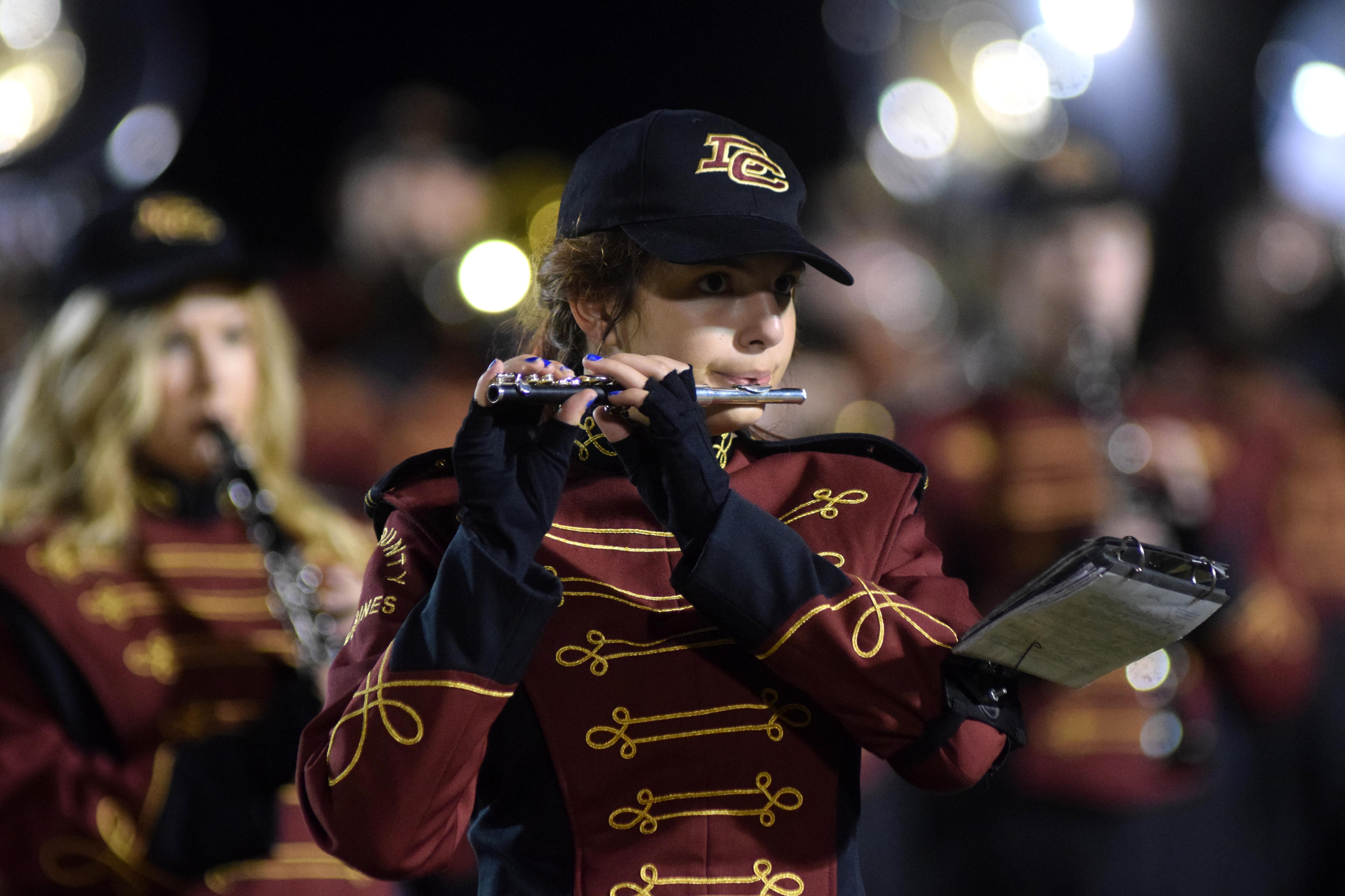 A piccolo player in the Dade County Band plays the alma mater before the game.  The Marching Wolverines recently got new uniforms.  The Gordon Lee Trojans visited the Dade County Wolverines in GHSA football action Thursday night, November 5, 2015.