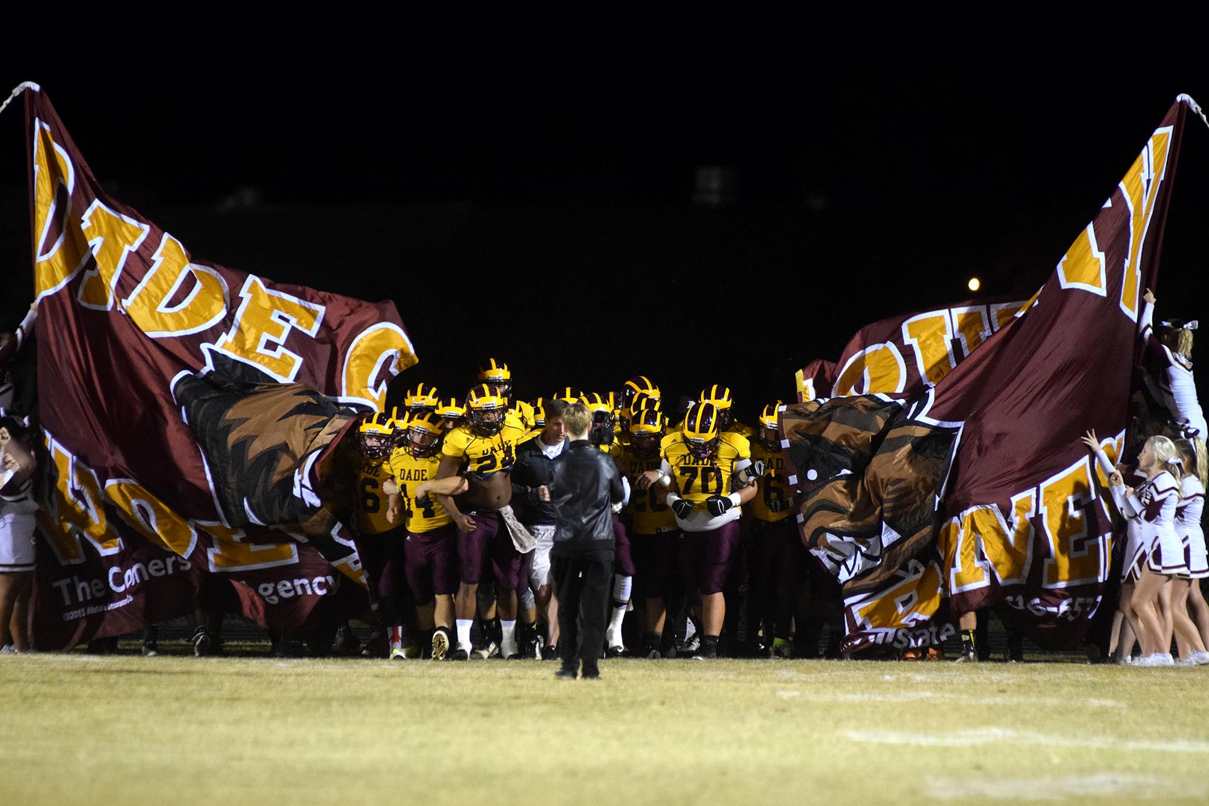 The Dade County Wolverines comes on the field arm-in-arm.  The Gordon Lee Trojans visited the Dade County Wolverines in GHSA football action Thursday night, November 5, 2015.