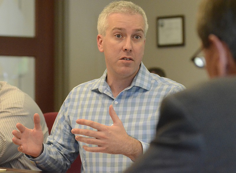 Chattanooga City Councilman Chris Anderson speaks at a meeting in 2014.
