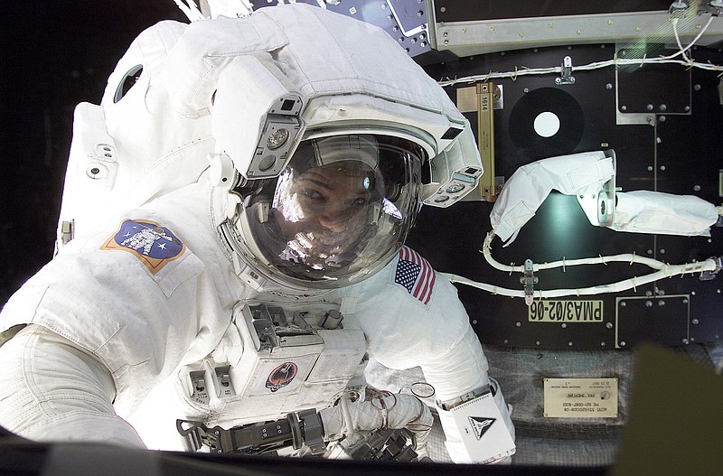 
              In this Feb. 12, 2001 photo released by the Science Channel, astronaut Robert L. Curbeam is pictured during a space walk. Curbeam is featured, along with other former astronauts on the Science Channel's series "Secret Space Escapes," premiering Nov. 10 at 10 p.m. ET. (NASA/Science Channel via AP)
            
