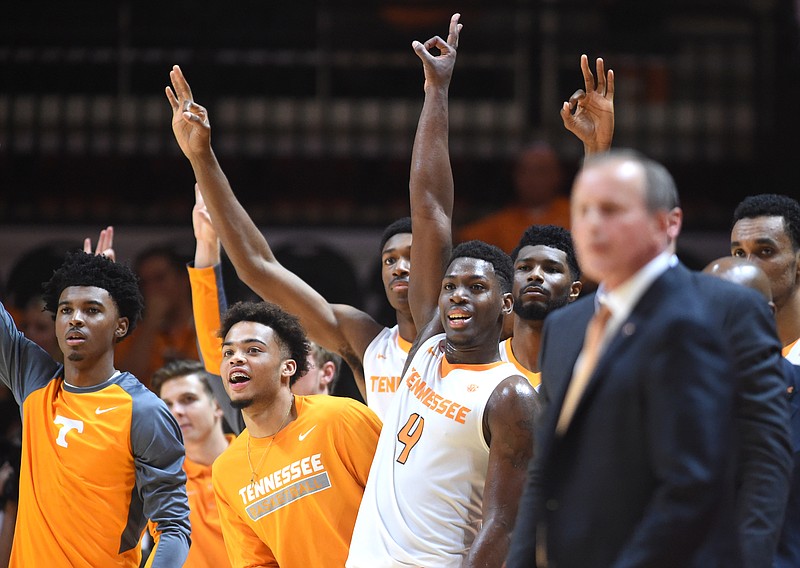 Tennessee forward Armani Moore (4) celebrates with teammates after a score during the first half against Alabama-Huntsville in a college basketball exhibition game Friday, Nov. 6, 2015, in Knoxville, Tenn. (Adam Lau/Knoxville News Sentinel via AP)